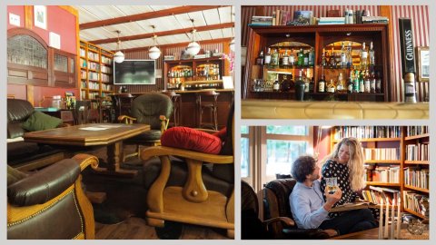 Gemütliche Bar mit Büchern, Ledersesseln & edlen Spirituosen in stilvollem Flair.